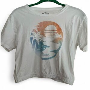 Hollister white graphic cropped t-shirt with ruched bottom.  Size XS